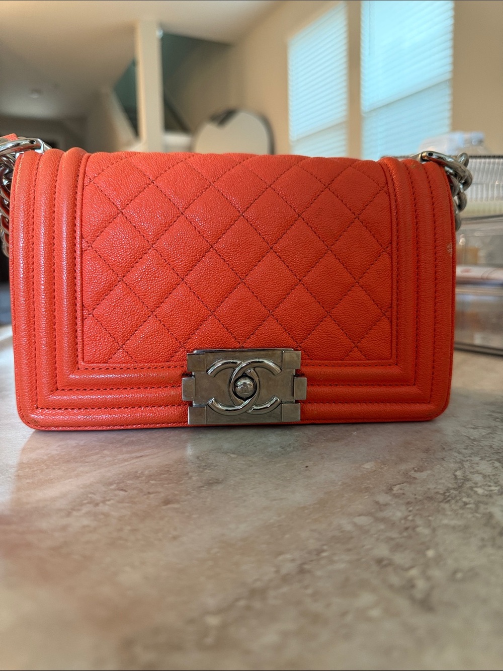 CHANEL Orange Quilted Boy Bag with Silver Chain